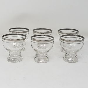 MCM 6 glasses silver toned band